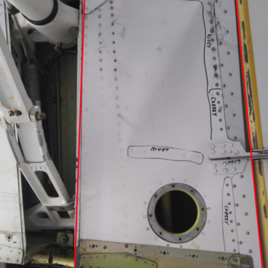 damaged lower portion of the left wing , included in the red lines– rivets damaged have been circled by a marking pen in black ink